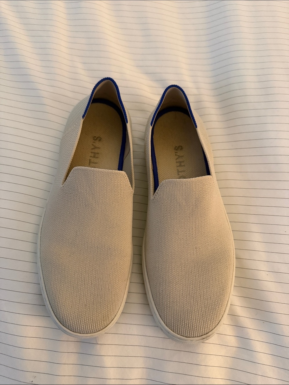 Rothy's Beige Slip-On Sneakers with Blue Trim